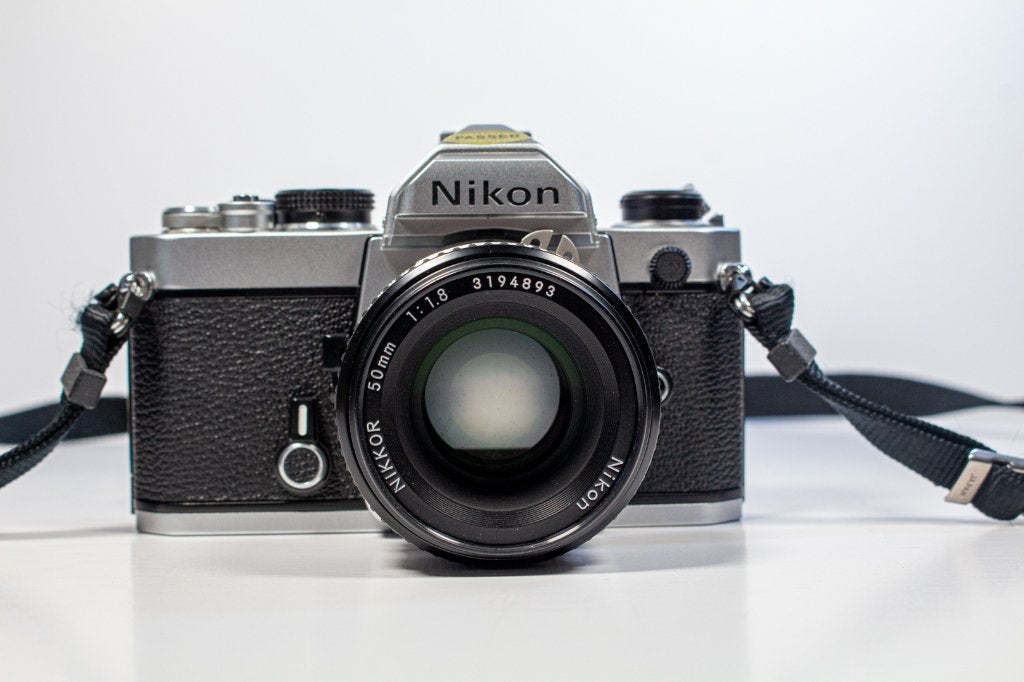 NIKON FM +nikkor 50mm f1.8   état exellent, Enlèvement, Comme neuf, Reflex miroir, Nikon