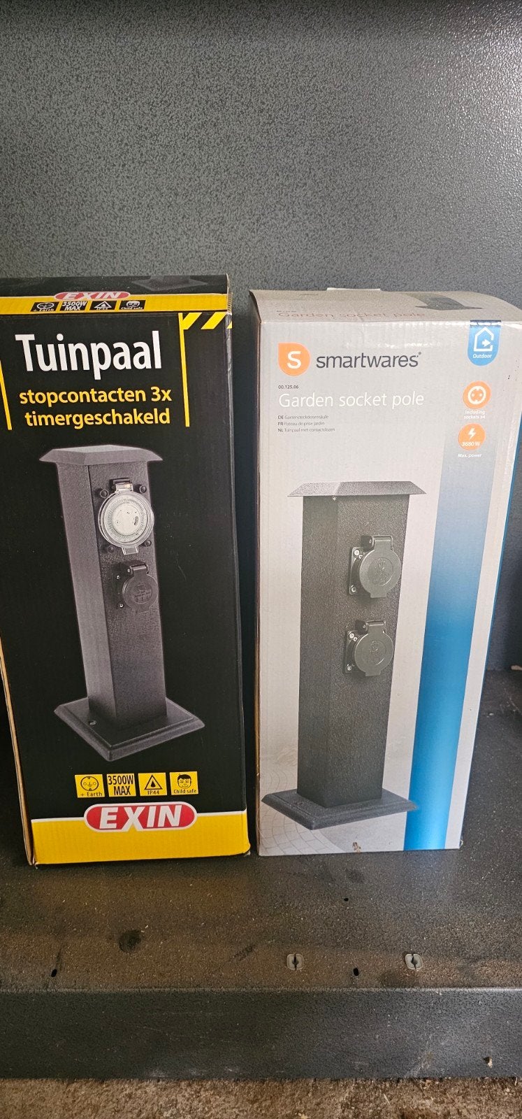 2 nieuwe tuinpalen met stopcontacten – in doos, Ophalen