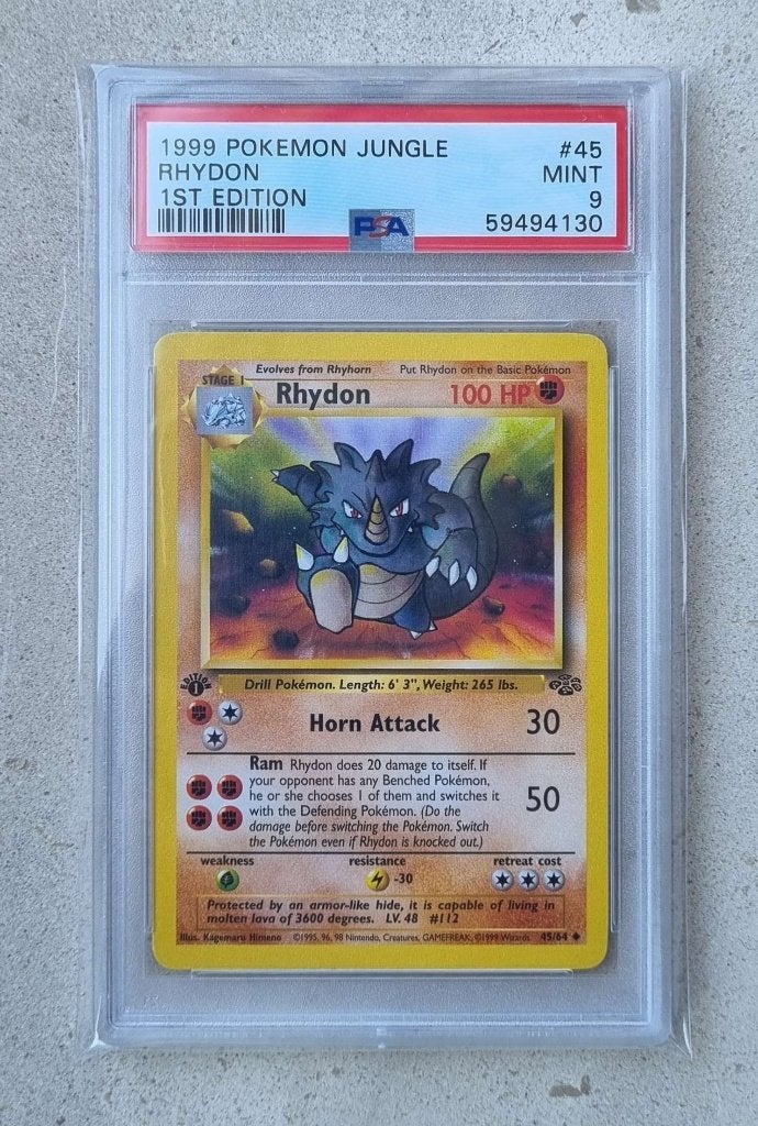Rhydon [1st Edition] #45 Pokemon Jungle PSA9, Ophalen of Verzenden, Nieuw, Overige typen, Foil