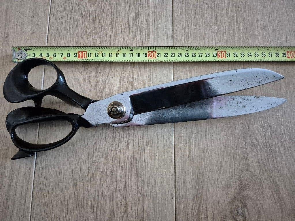 schaar voor kleermaker, Ophalen