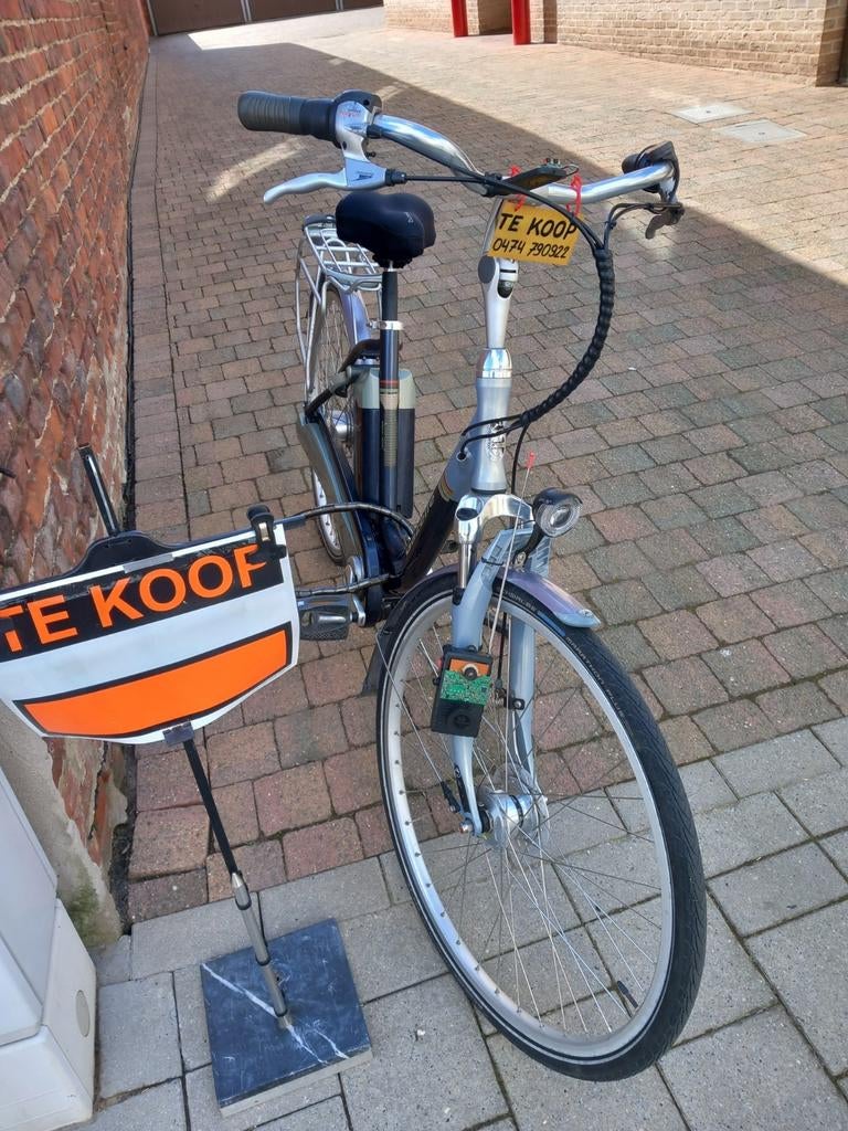 Retro elektrische fiets met middenmotor en nieuwe batterij, Ophalen