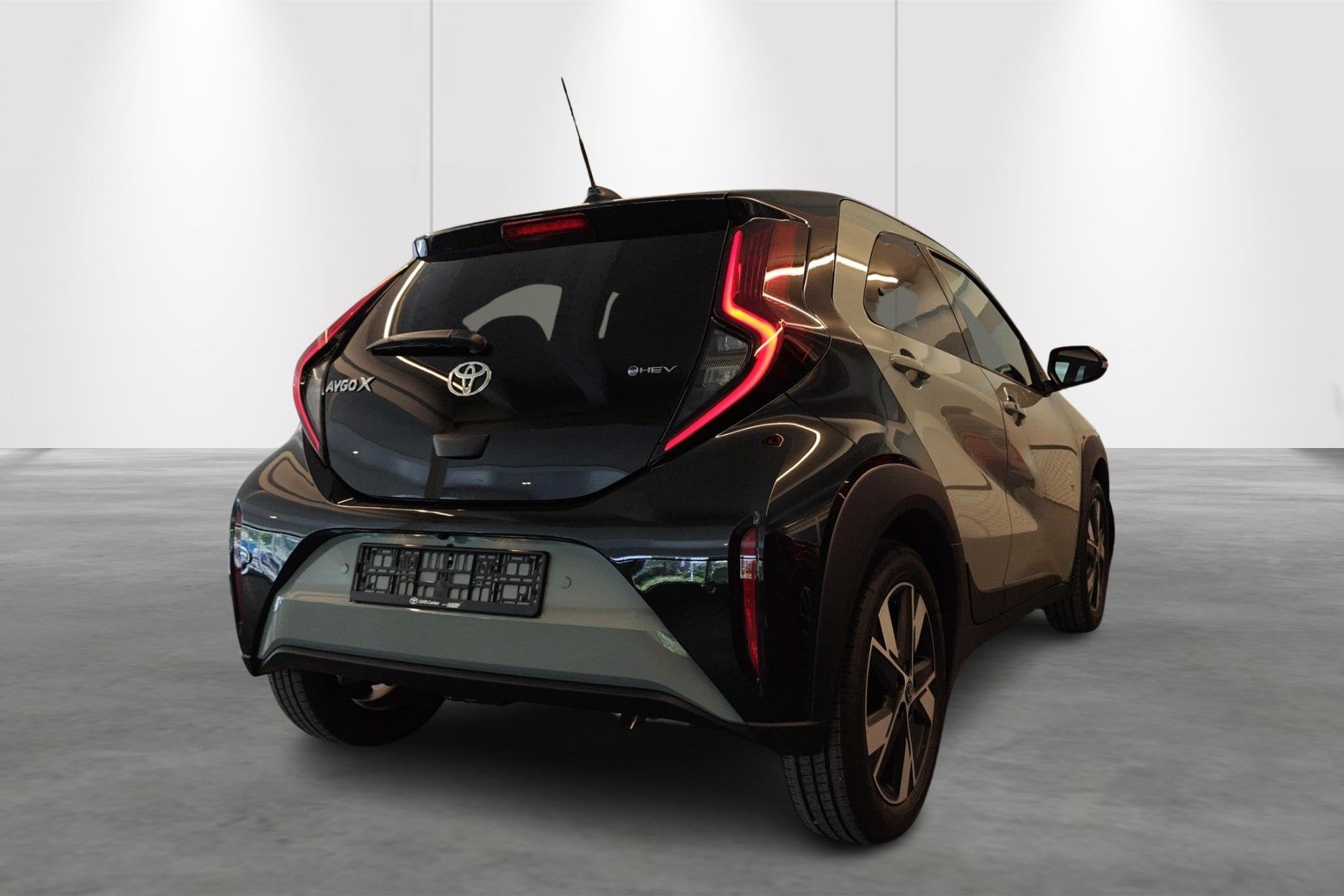 Toyota Aygo X 1.5 VVT-i HEV Pulse e-CVT + Tech Pack - incl 2, Auto's, Toyota, 4 zetels, Stof, Gebruikt, Zwart