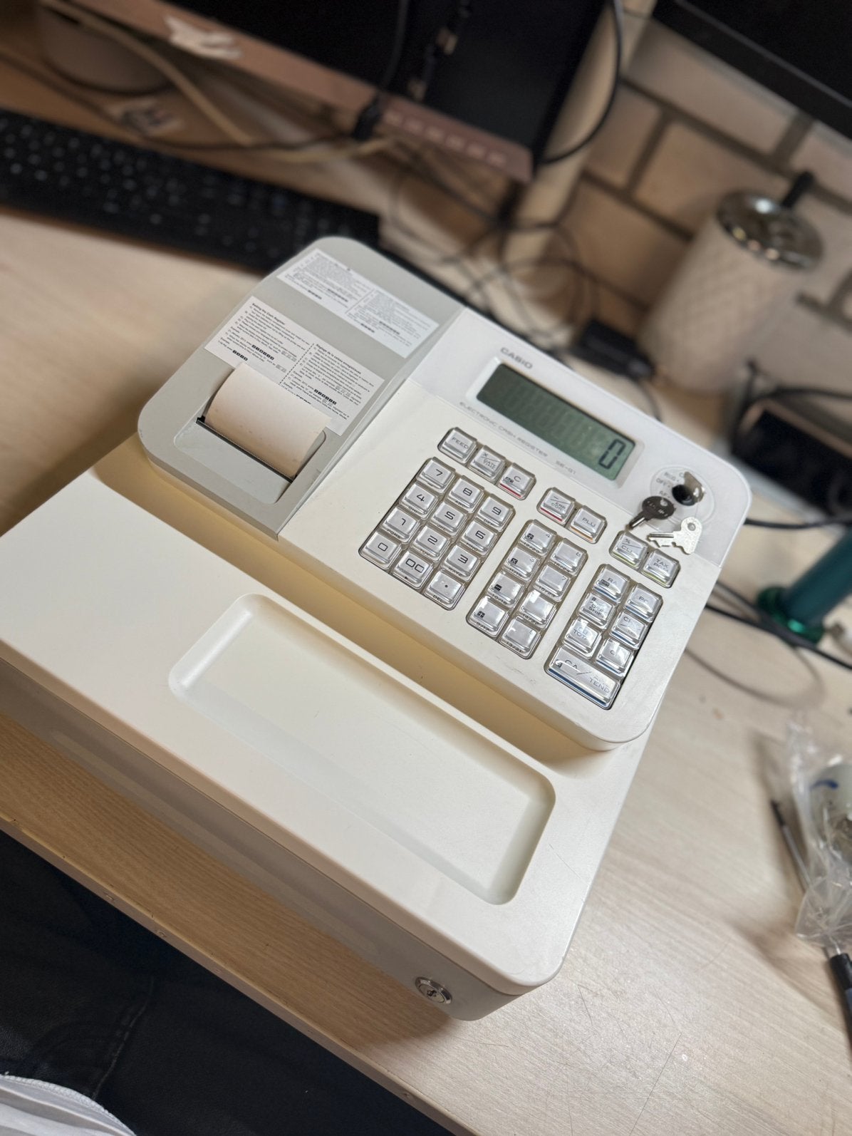 Casio SE-G1 elektronisch kassaregister, Enlèvement