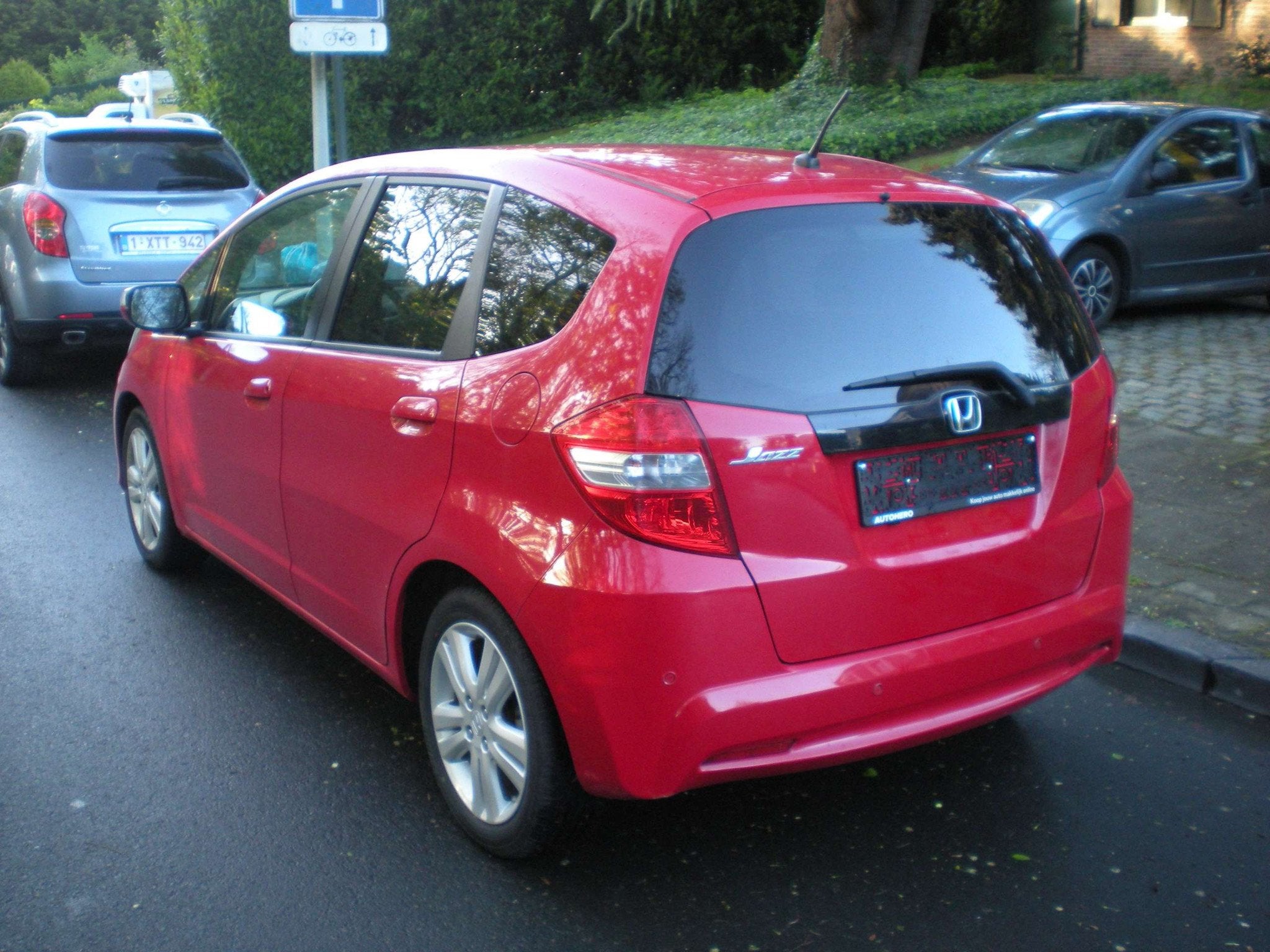 Honda Jazz 1.4i Elegance, Autos, Honda, Rouge, Euro 5, Achat, 129 g/km