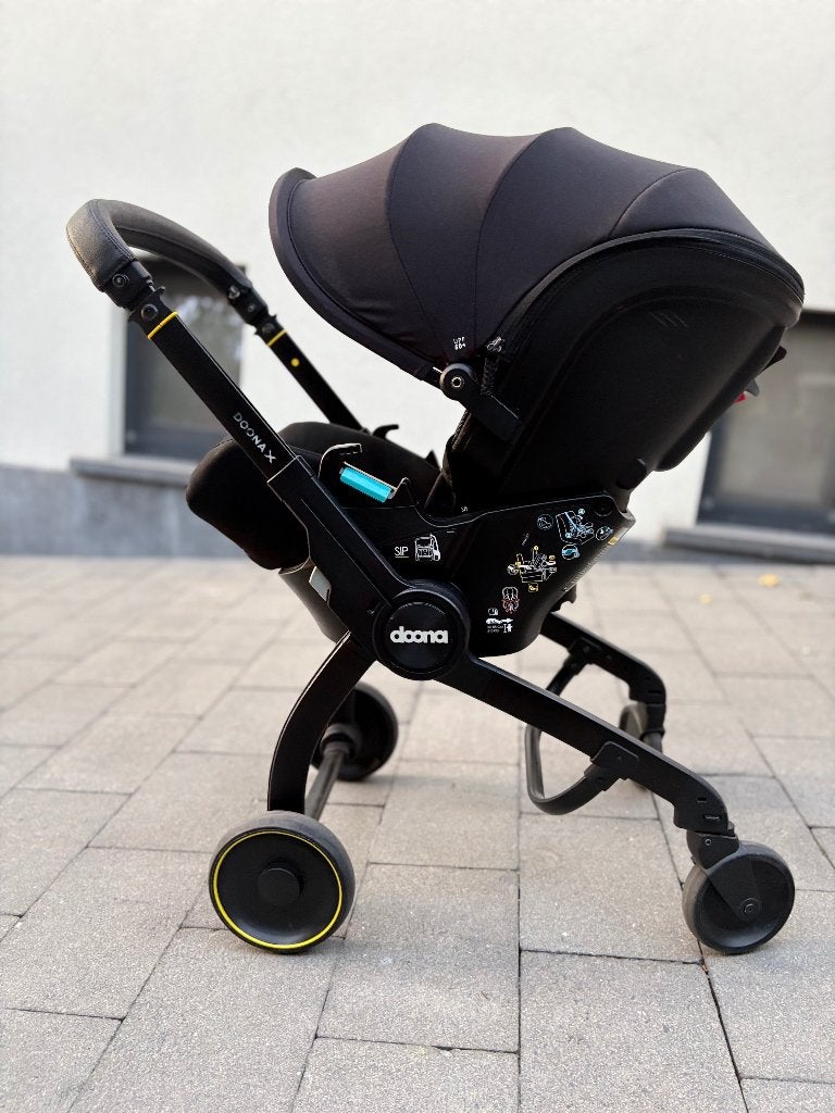 Siège auto/poussette Doona, Enfants & Bébés, Enlèvement ou Envoi, Utilisé, Autres marques, Ombrelle