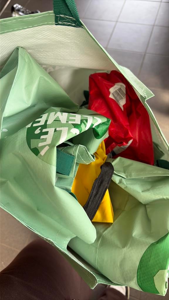 Gratis winkelzakken, Ophalen