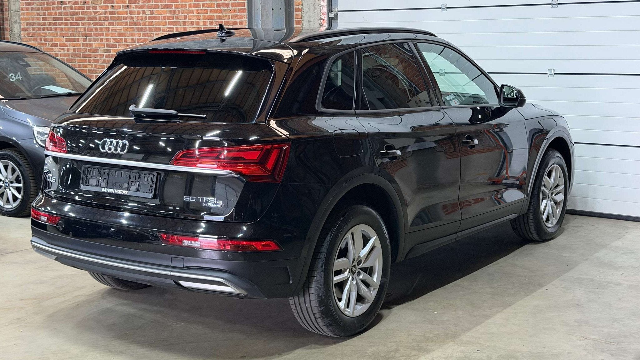 Audi Q5 PHEV 50 TFSIe Garantie Automaat Plug in Hybride Be, Auto's, Audi, Stof, Gebruikt, 35 g/km, Zwart