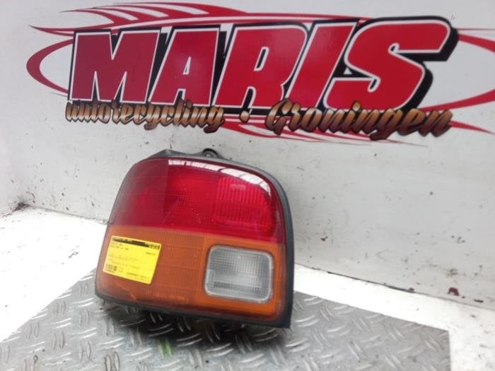 Feu arrière gauche d'un Daihatsu Cuore, Daihatsu, -, -, 3 mois de garantie