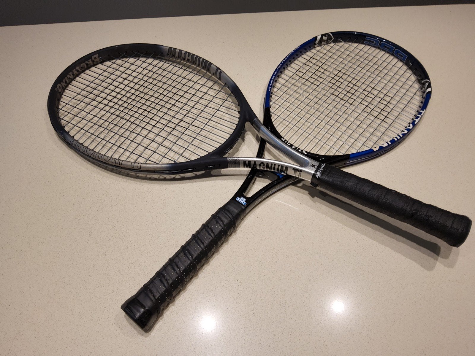 2 tennisrackets, Ophalen