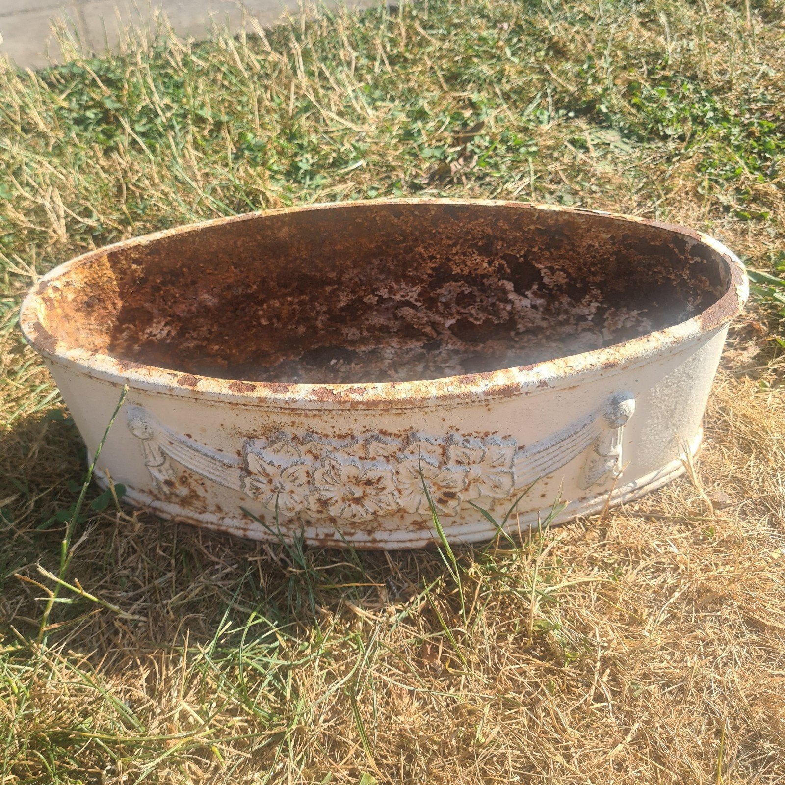 Brocante gietijzeren bloembak, Ophalen