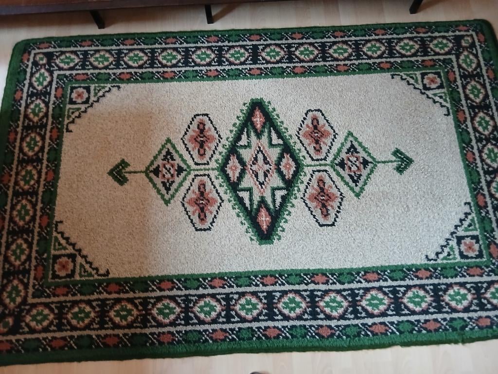 SMIJRNA TAPIJT, Ophalen