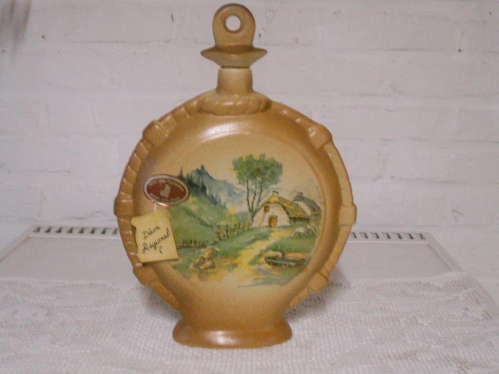 fles met landschap, Ophalen