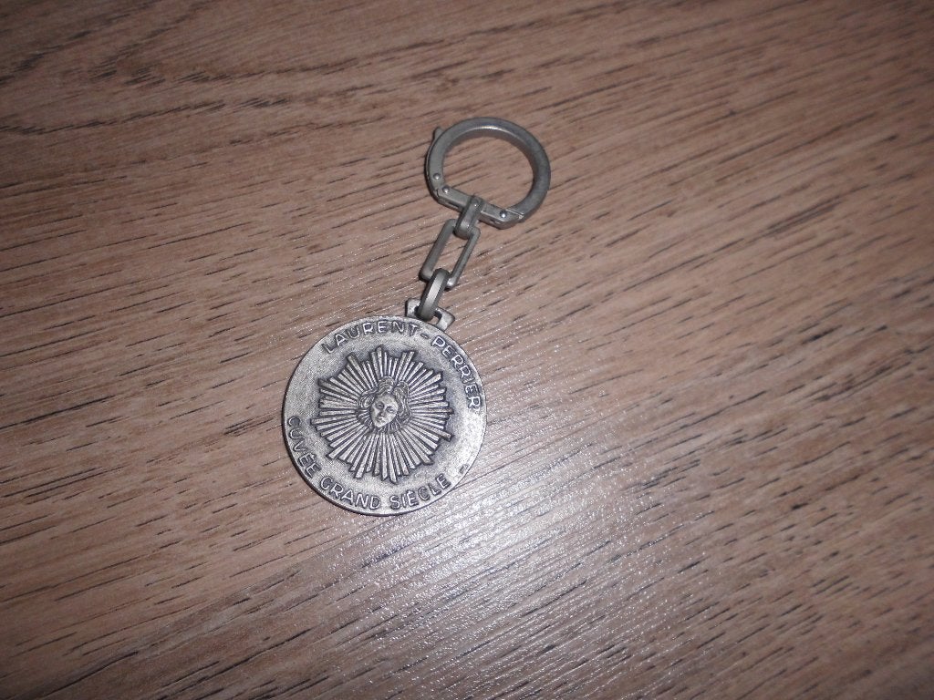ancien porte cles cuvee CHAMPAGNE laurent perrier, Enlèvement ou Envoi