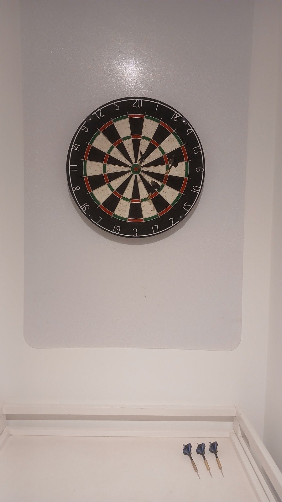 Darts bord met 6 pijltjes, Ophalen