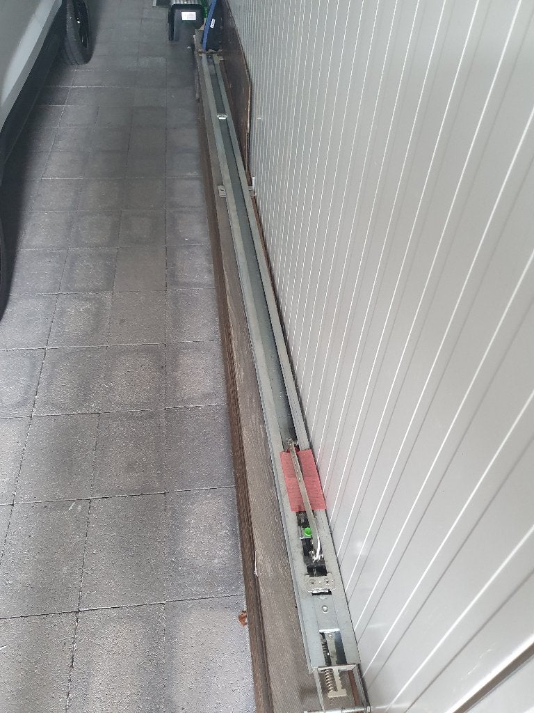 Rail voor garagepoort, Ophalen
