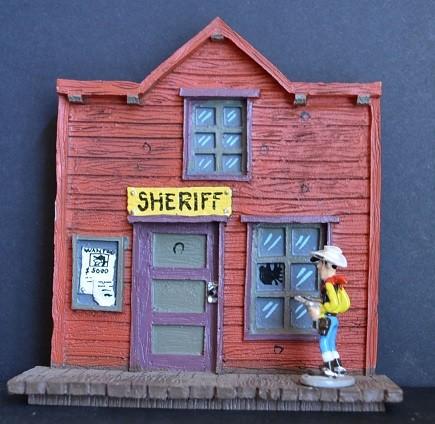 Lucky Luke, figurine en plomb : Le bureau du sheriff (2007)., Enlèvement ou Envoi, Autres personnages, Neuf, Statue ou Figurine