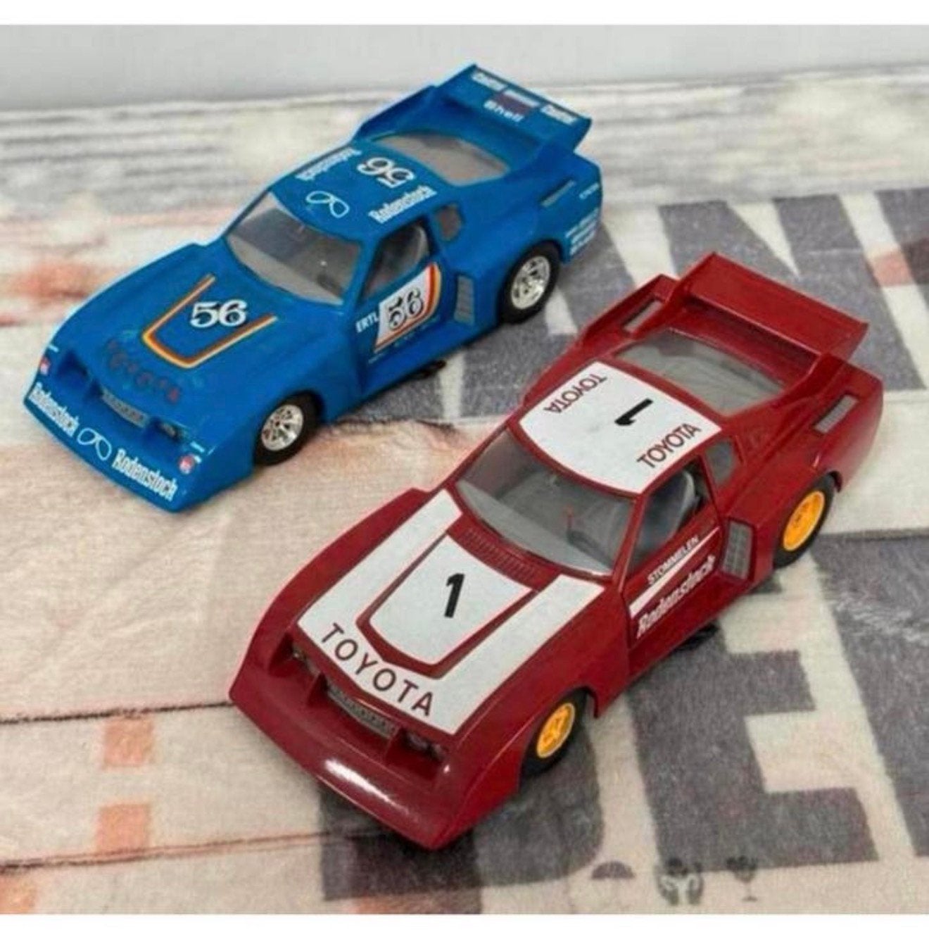2X 1:24 Bburago Toyota Celica Liftback Gr 5 Rodenstock 1978, Ophalen of Verzenden, Zo goed als nieuw, Auto, Burago