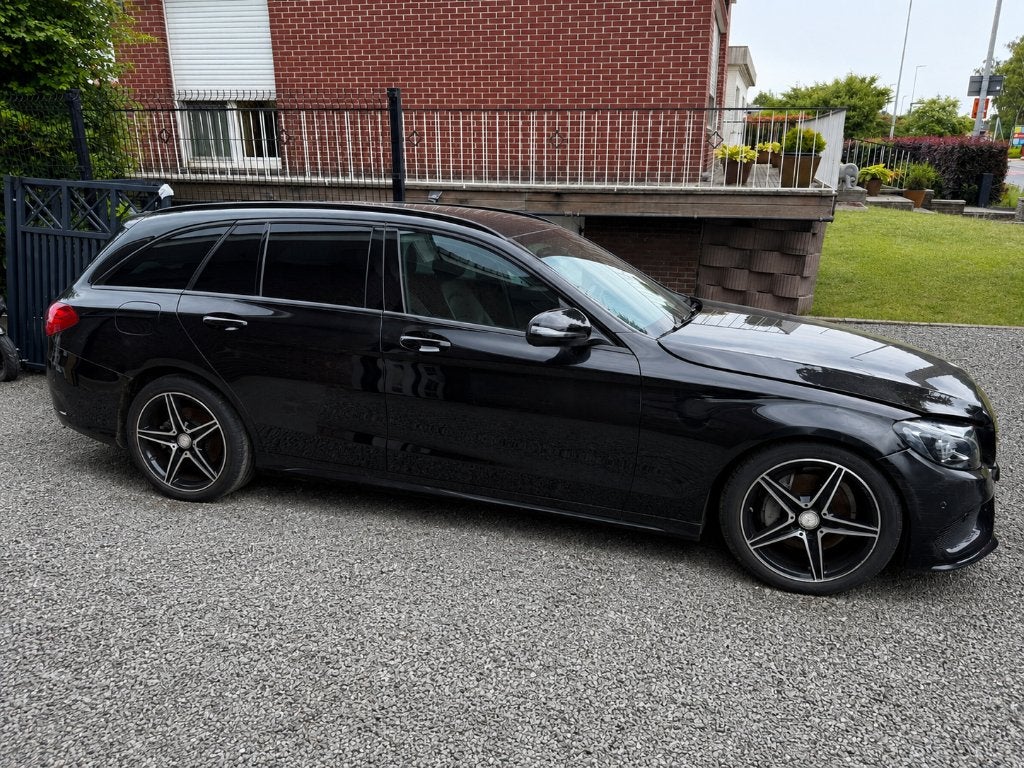 Mercedes-Benz C200d AMG Line Automaat Schadevoertuig, Auto's, 4 cilinders, Zwart, Leder, 5 deurs