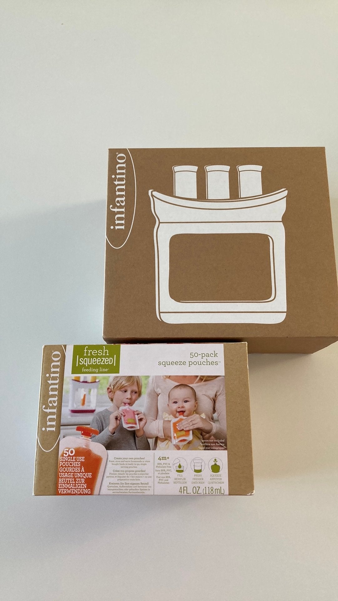 Infantino knijpfruitjesmaker en 25 lege knijpzakjes, Portable, Comme neuf, Enlèvement, Autres marques