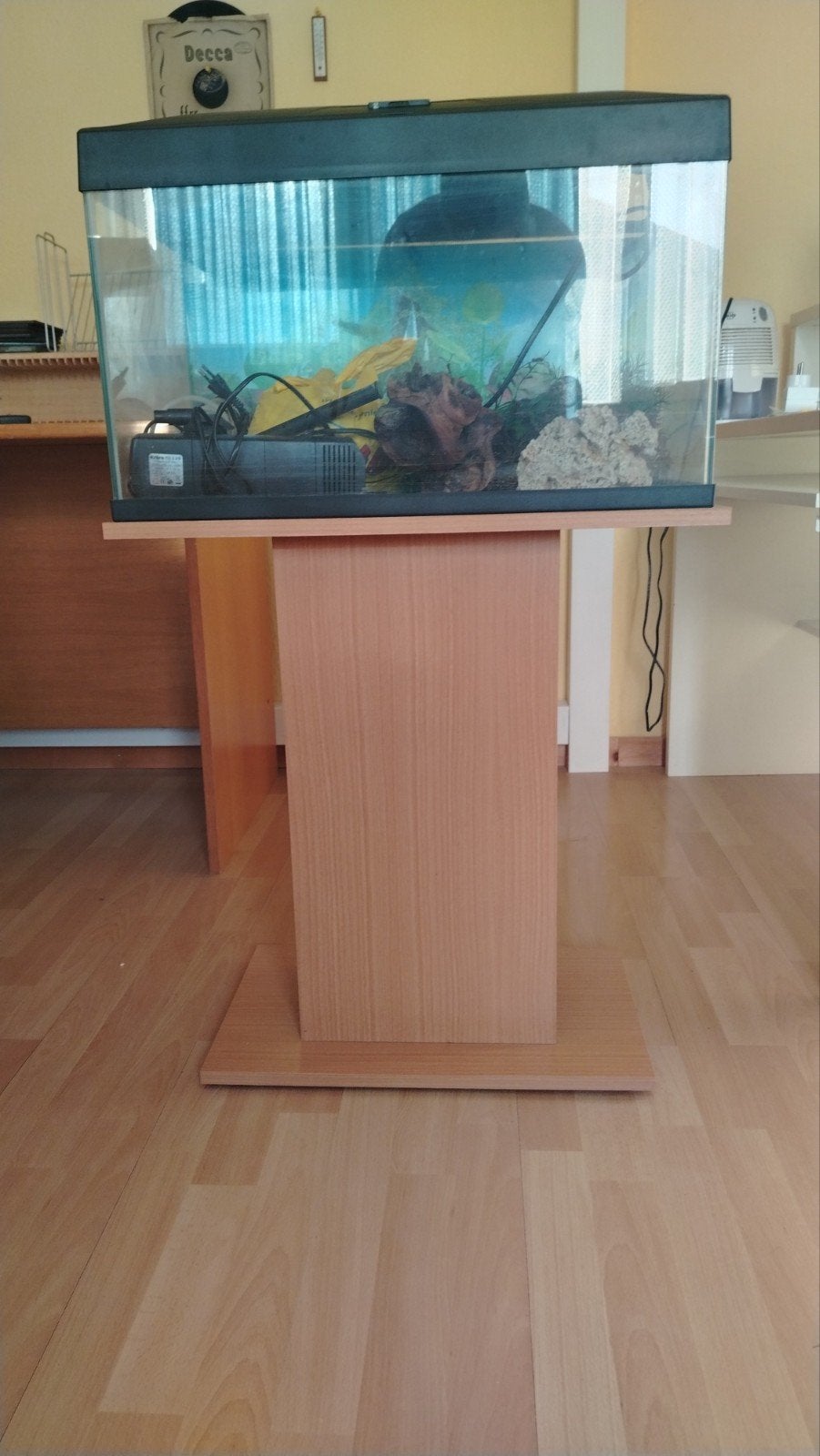 Aquarium avec mobilier, Enlèvement