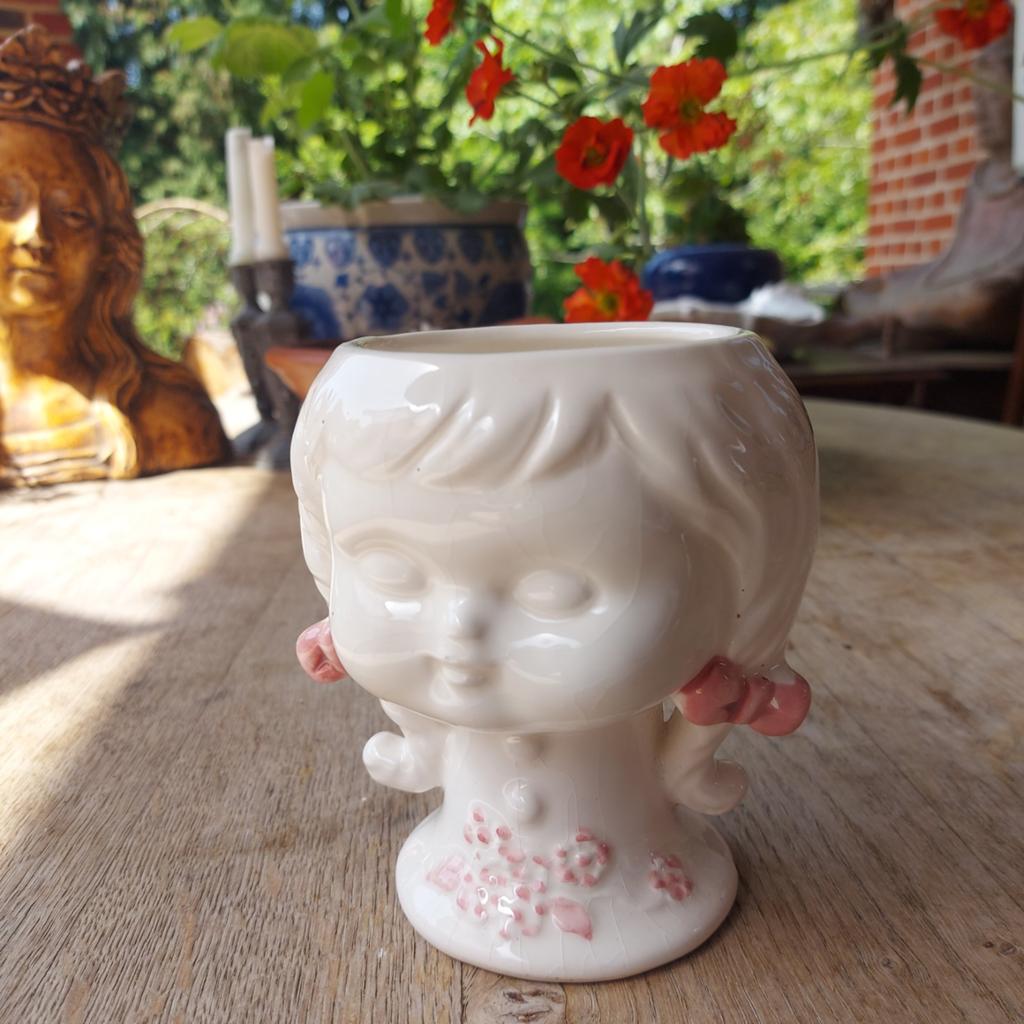 Pot de fleurs/tête de fille/JR 70, Enlèvement