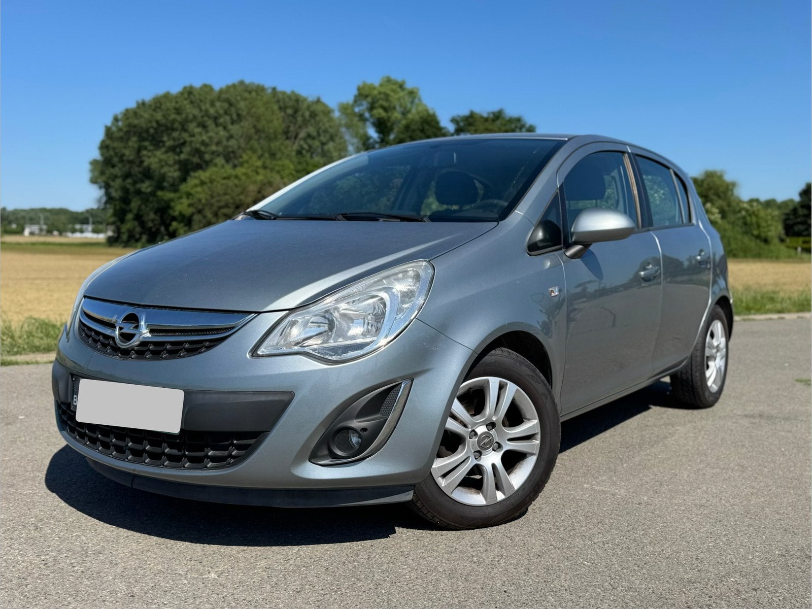 Opel Corsa 1.2 benzine • 2013 75dkm! • Dealeronderhouden, Auto's, Voorwielaandrijving, Euro 5, Stof, 63 kW