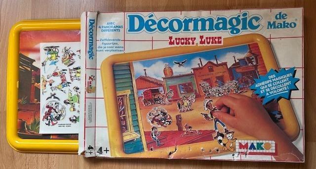 LUCKY LUKE CURIOSUM DECORMAGIC SPEELDOOS, Eén stripboek, Ophalen of Verzenden, Gelezen, Morris / Goscinny