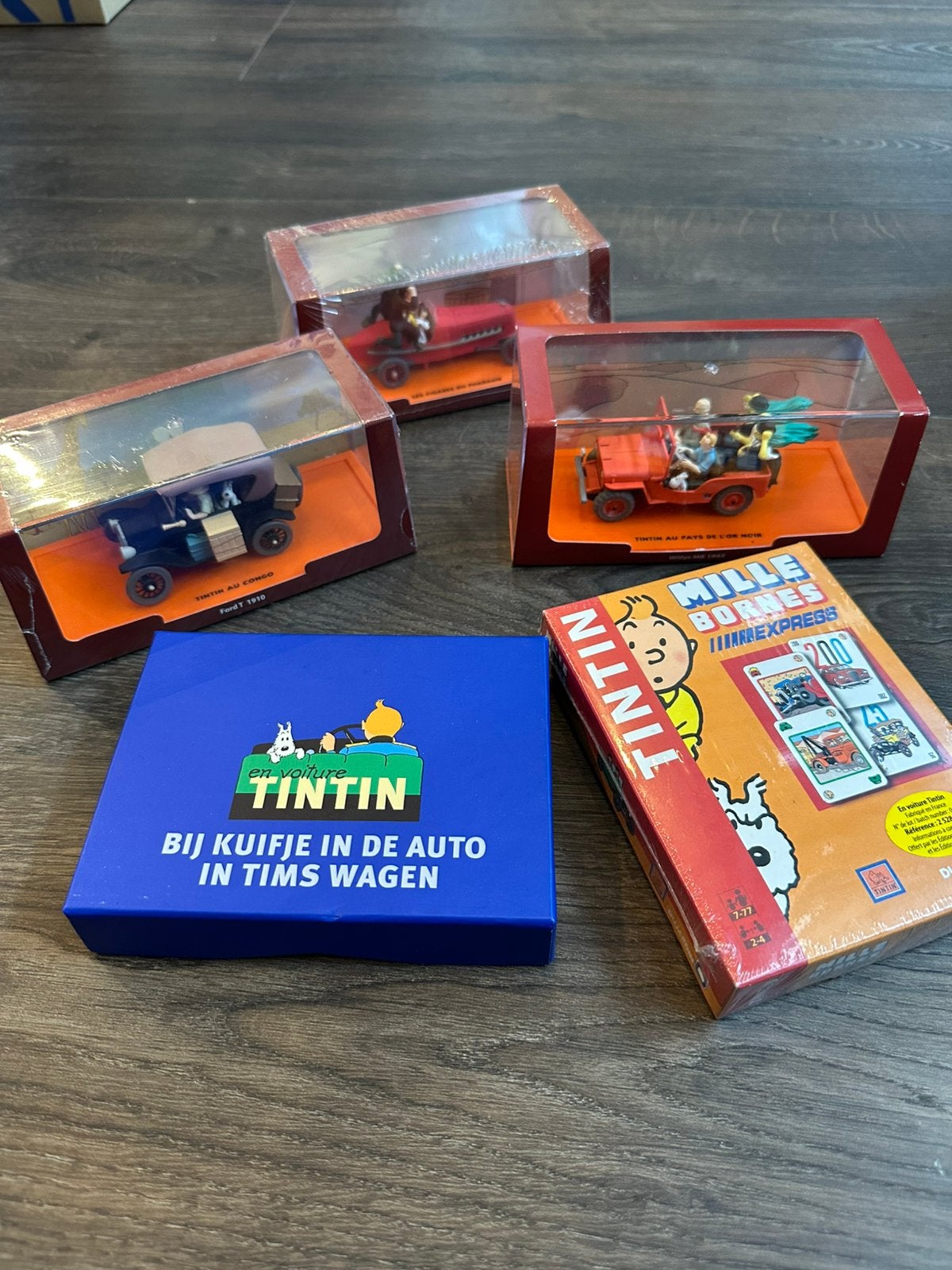 Kuifje / Tintin verzamelitems – 3 modelauto’s + 2 spellen, Envoi