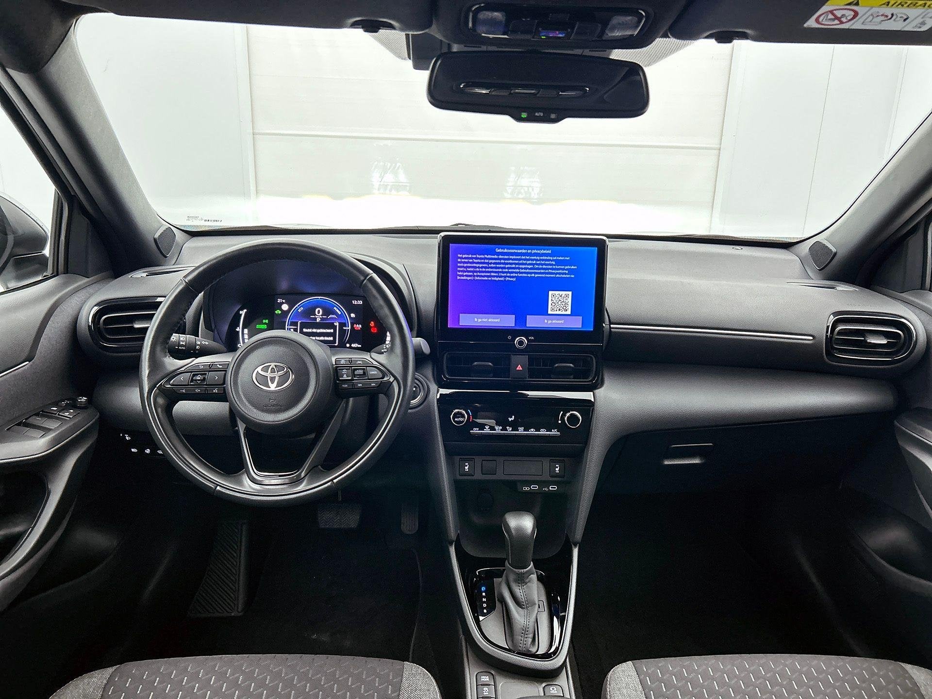 Toyota Yaris Cross 1.5 Hybrid Dynamic Plus | Achteruitrijcam, Auto's, Dealer onderhouden, Gebruikt, 750 kg, Overige kleuren