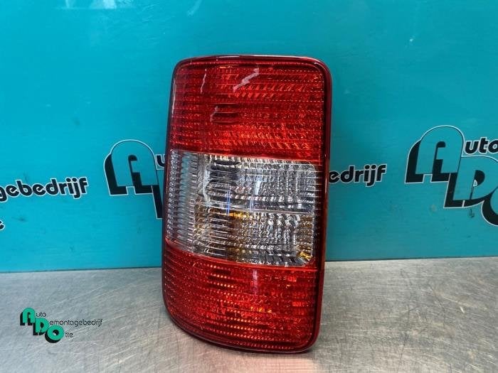 Achterlicht links van een Volkswagen Caddy (Caddy 04-), Gebruikt, -, Volkswagen, -
