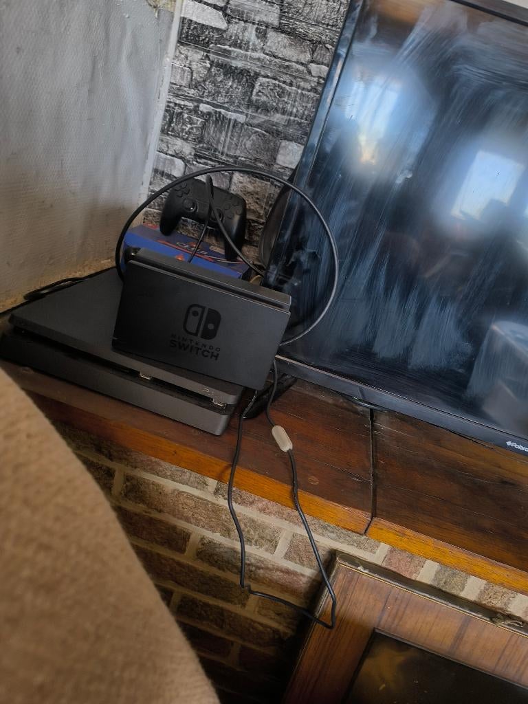 Bonjour à vendre ou échange Nintendo switch, Enlèvement, Comme neuf
