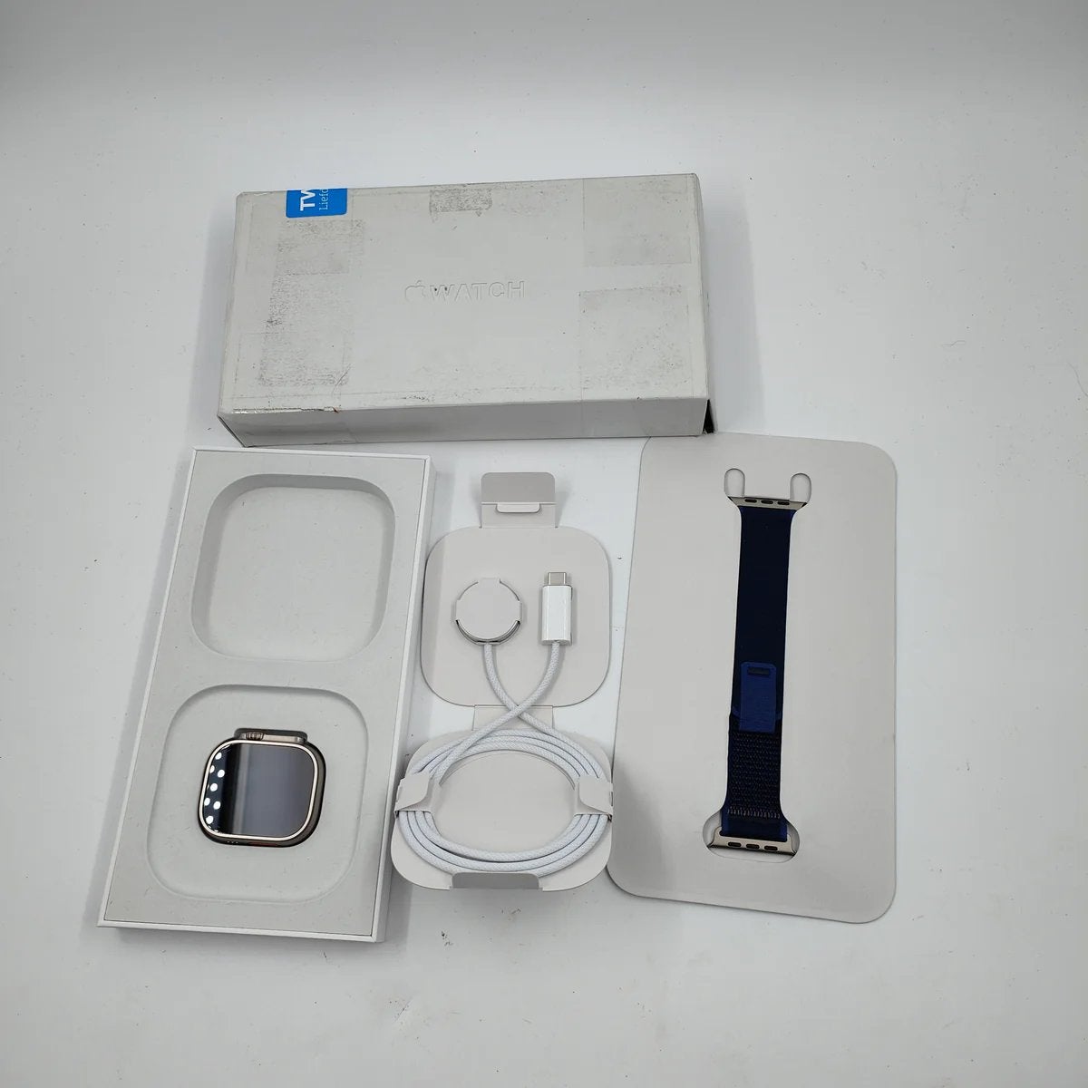 Apple Watch Ultra 2 4G 49mm Zilver Trail Band Blauw M/L, Bijoux, Sacs & Beauté, Montres connectées, Enlèvement, Comme neuf, Argent