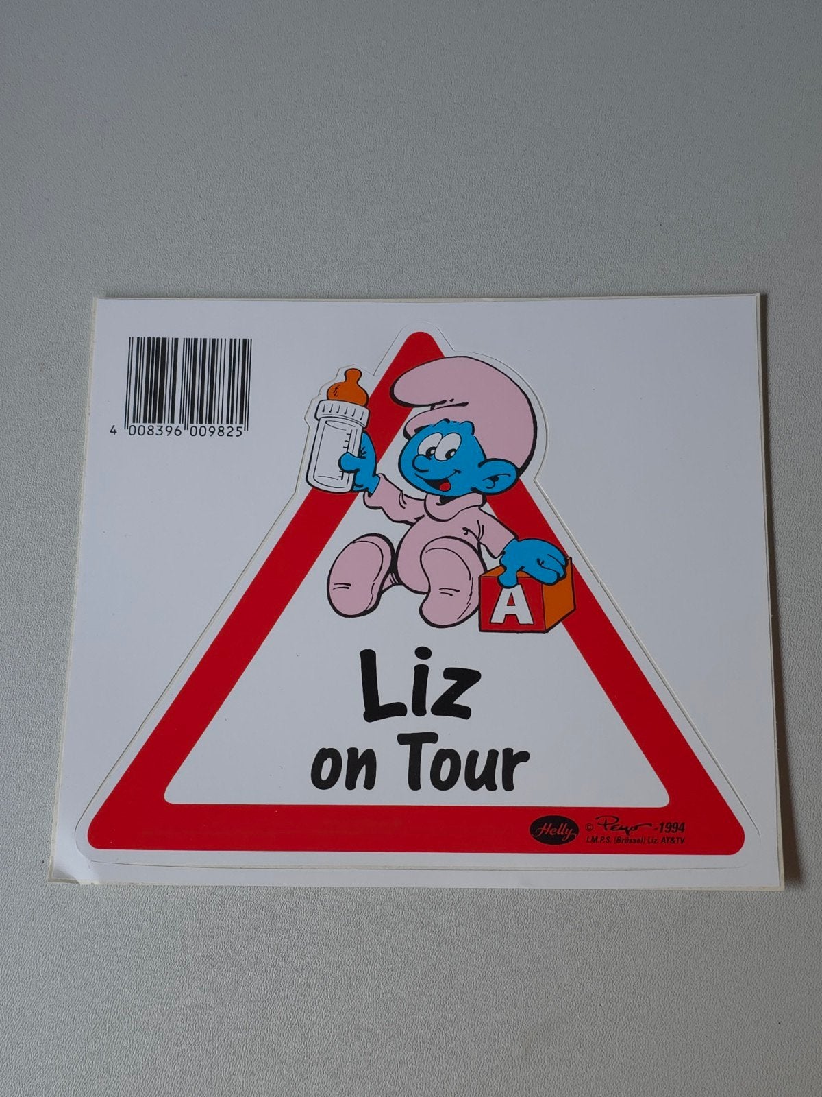 Autocollant Bébé Schtroumpf en voiture Liz, Collections, Schtroumpfs, Envoi, Comme neuf, Bébé Schtroumpf, Autres types