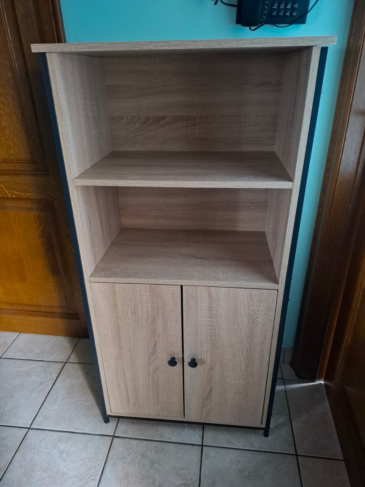 Kast met deurtjes en open gedeelte, Ophalen