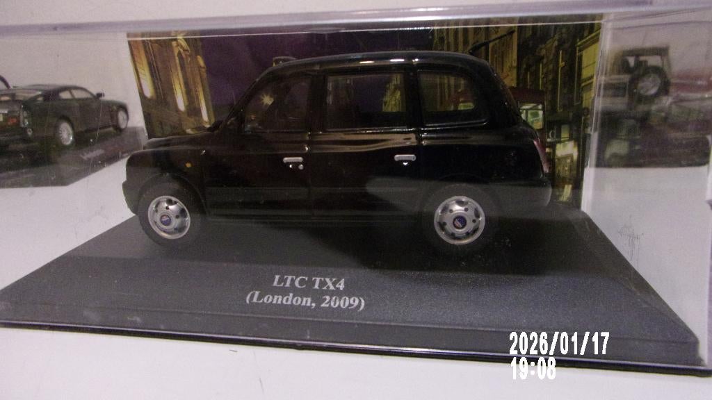 LONDON TAXI LTC TX4 2009.IXO 1/43 COMME NEUVE en VITRINE, Hobby en Vrije tijd, Modelauto's | 1:43, Zo goed als nieuw, Auto, Overige merken