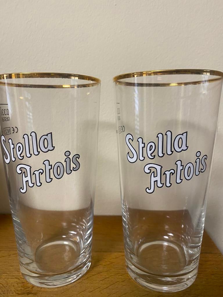Paar antieke geëmailleerde Stella Artois-glazen, Ophalen of Verzenden, Zo goed als nieuw