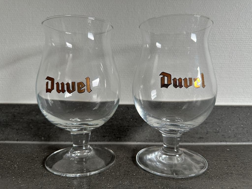 Lot van 2 Duvel glazen, Ophalen, Zo goed als nieuw, Bierglas
