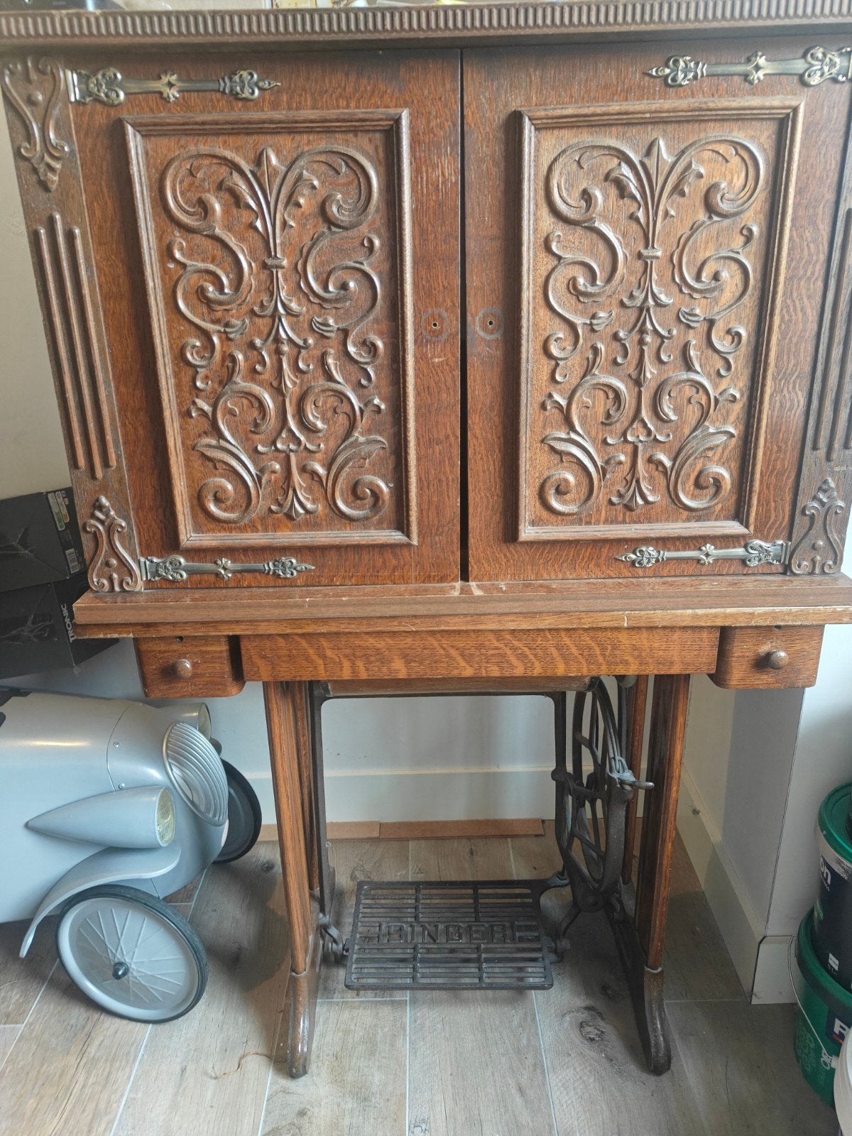 singer naaimachine met kast, Ophalen