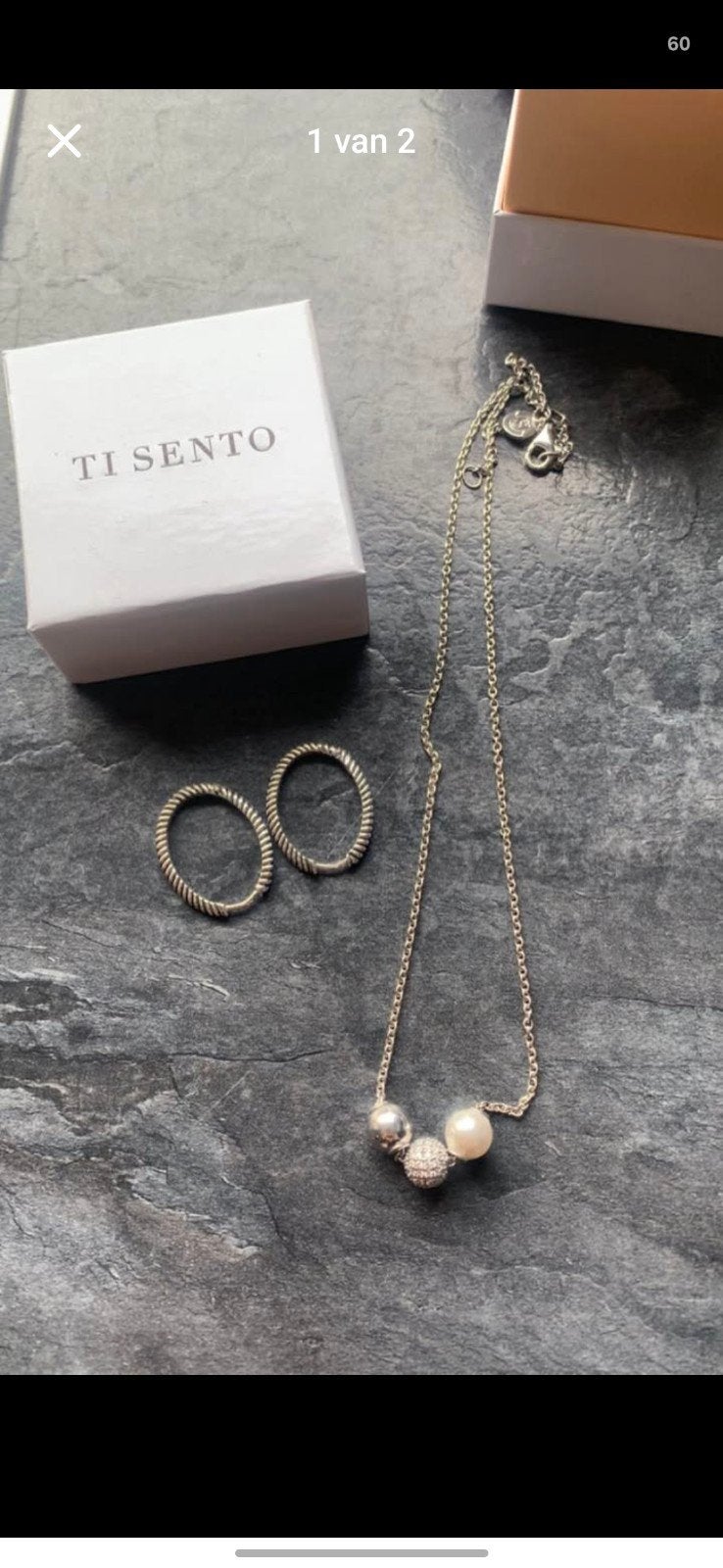 Ti Sento oorbellen en ketting, Ophalen