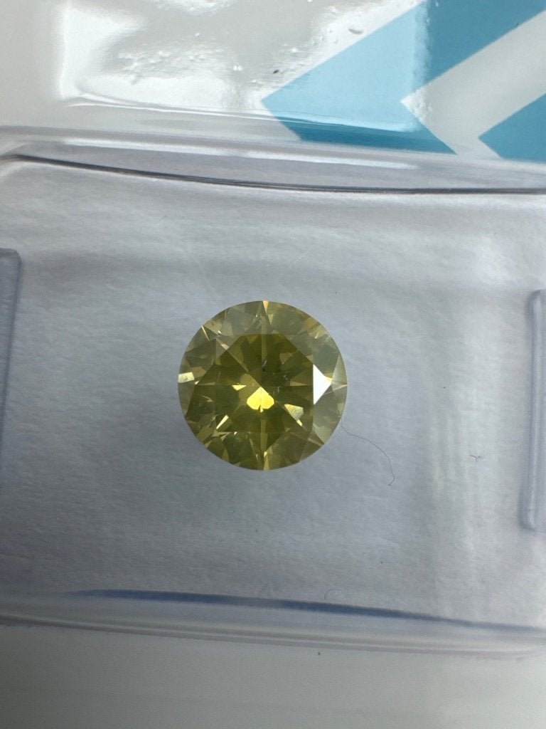 Diamant (naturel), 0,83 ct, rond, vert fantaisie, jaune IGI, Enlèvement ou Envoi, Neuf