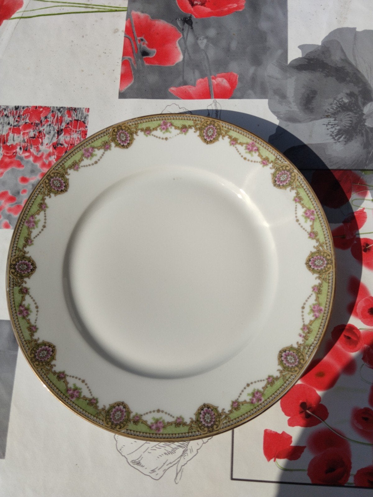12 assiettes en porcelaine de Limoges, Enlèvement