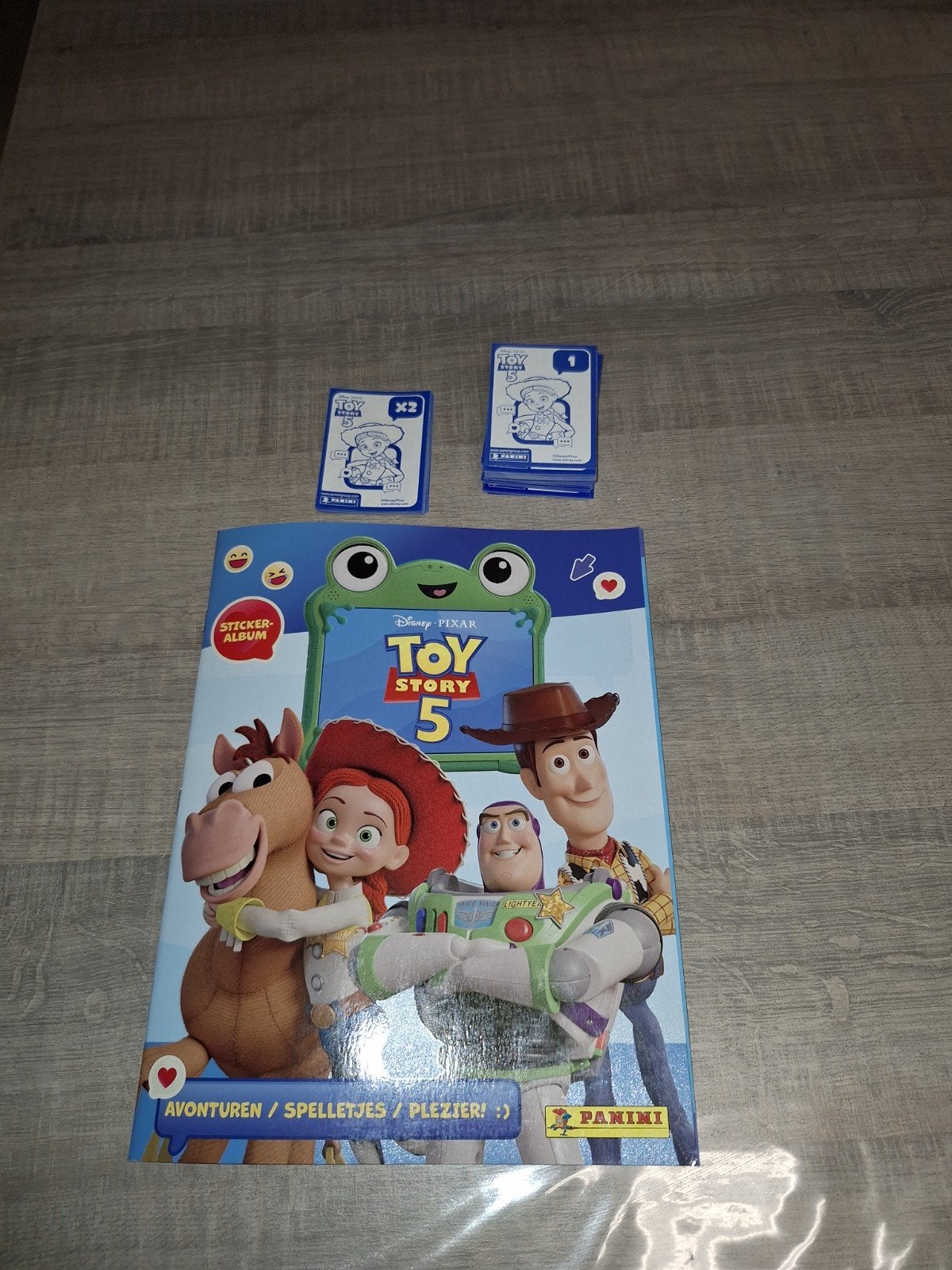 Ruile panini toy story 5, Ophalen