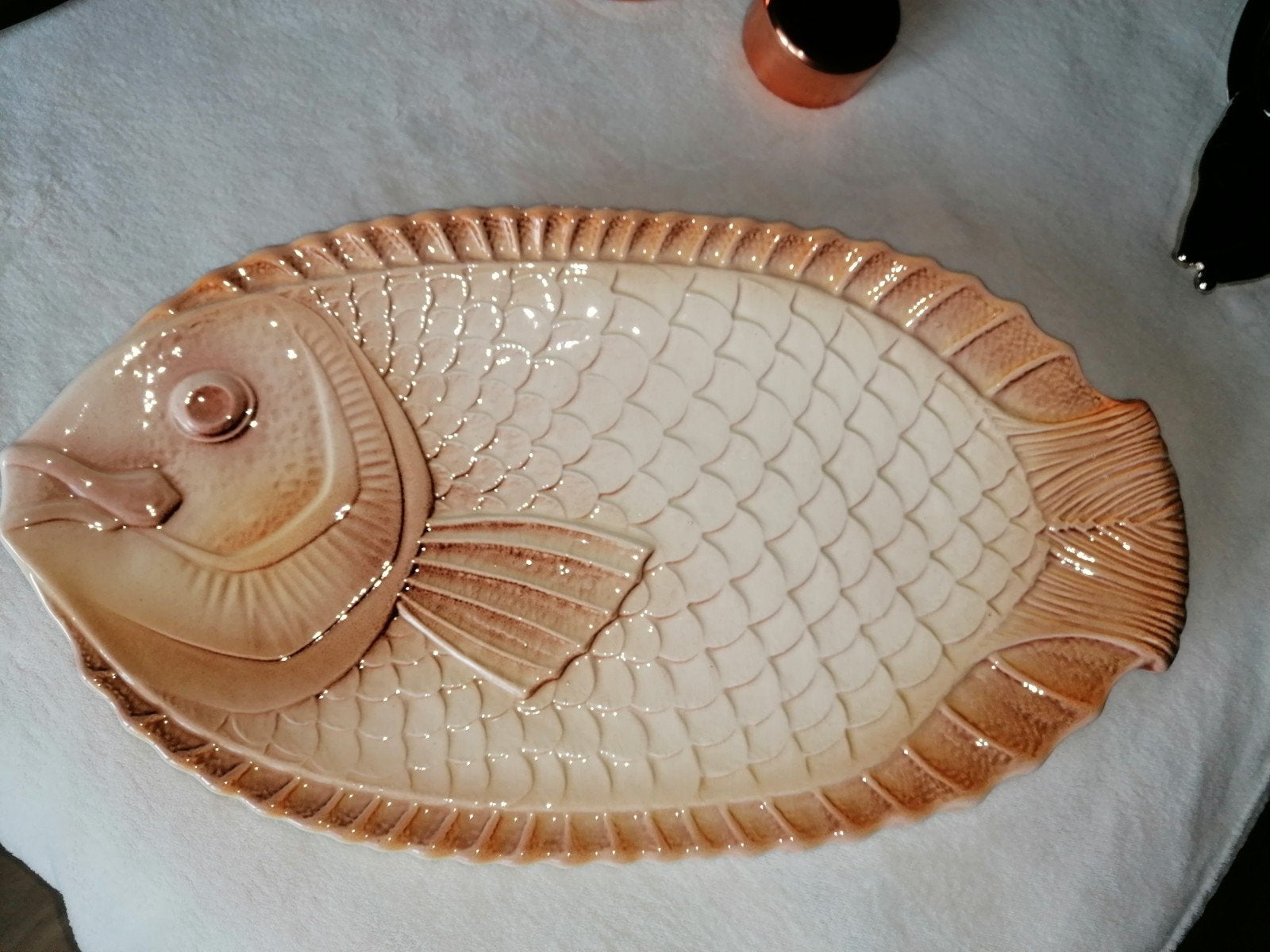 service à poisson, Enlèvement