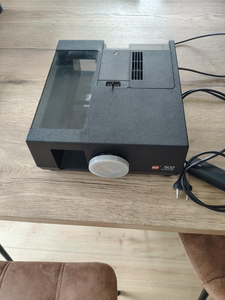 Diaprojector met autofocus, Enlèvement