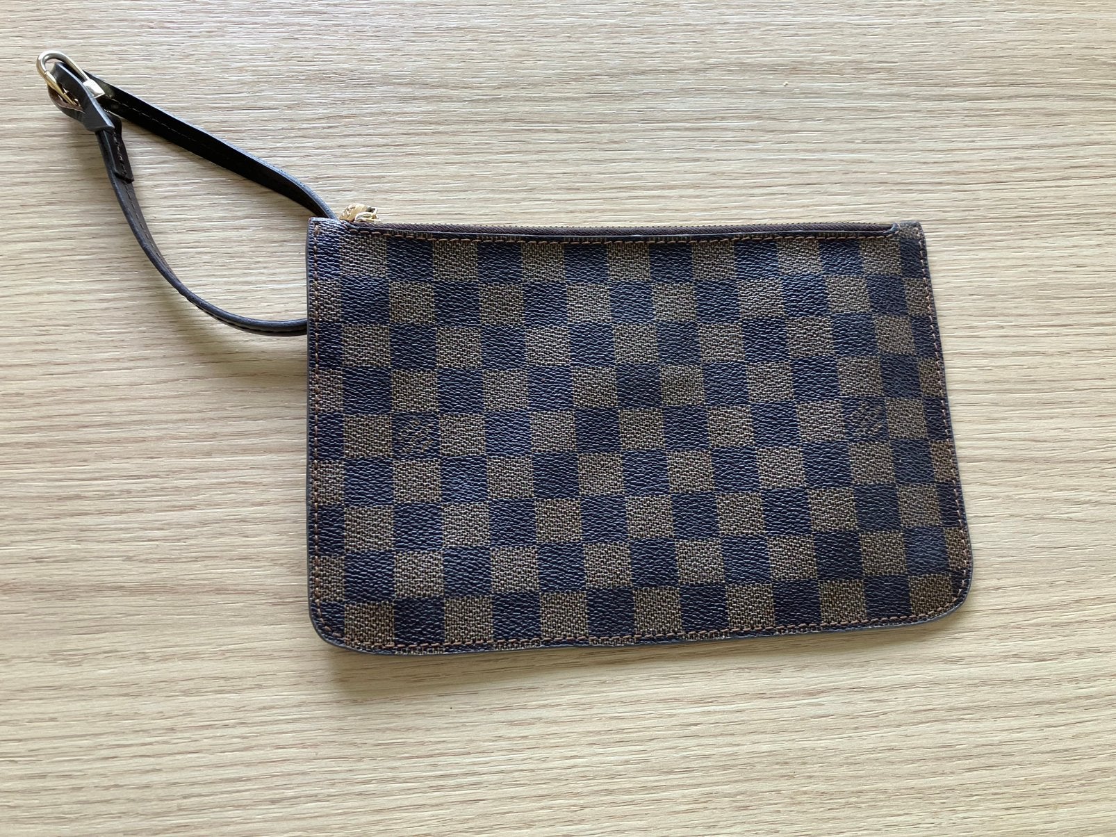 Louis Vuitton pouchette zeer goede staat genummerd, Ophalen of Verzenden, Zo goed als nieuw