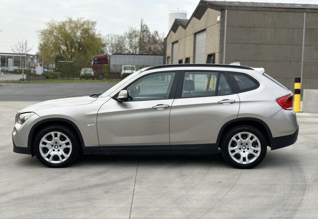 BMW X1 sDrive18d 2011 Automaat 130450km Navi Cruise Leder, Auto's, 1995 cc, Zwart, Beige, Leder