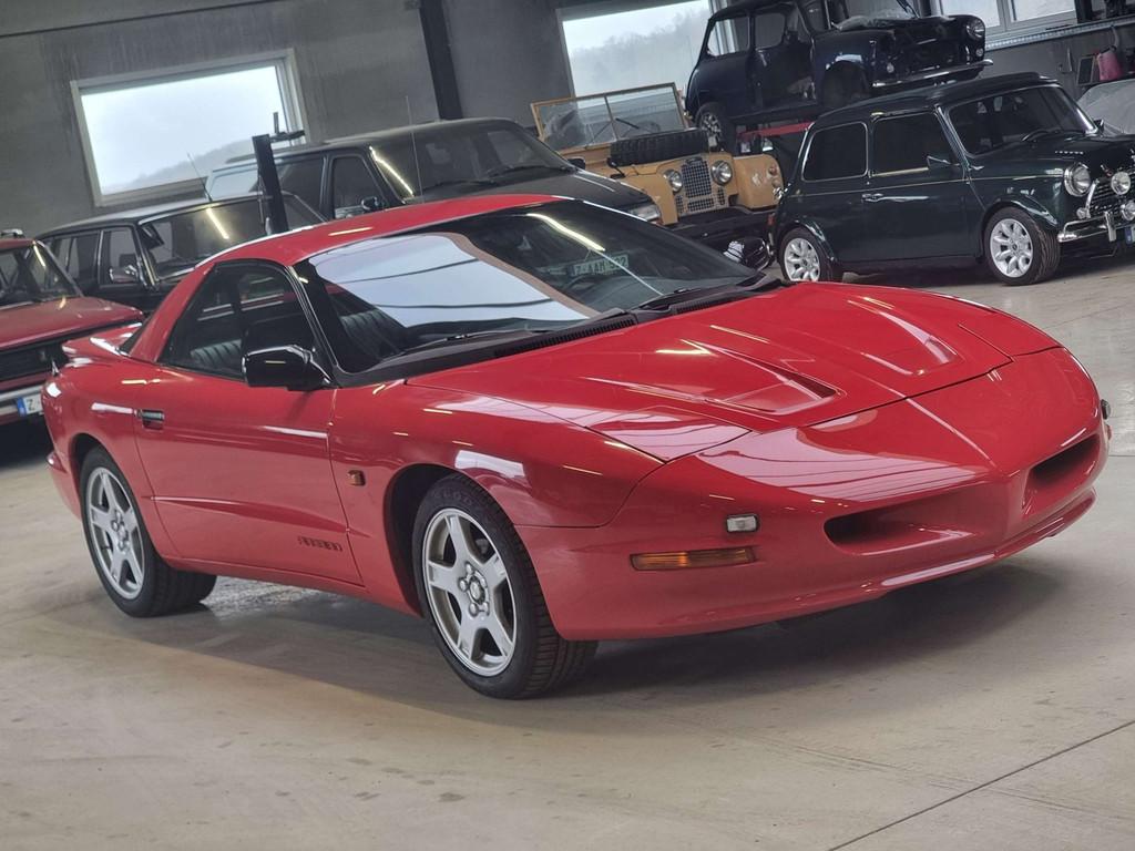 Pontiac Firebird 3.4i V6 *AUTOMATIQUE * 1ER PROPRIETAIRE, Auto's, 4 zetels, Achterwielaandrijving, Pontiac, Leder