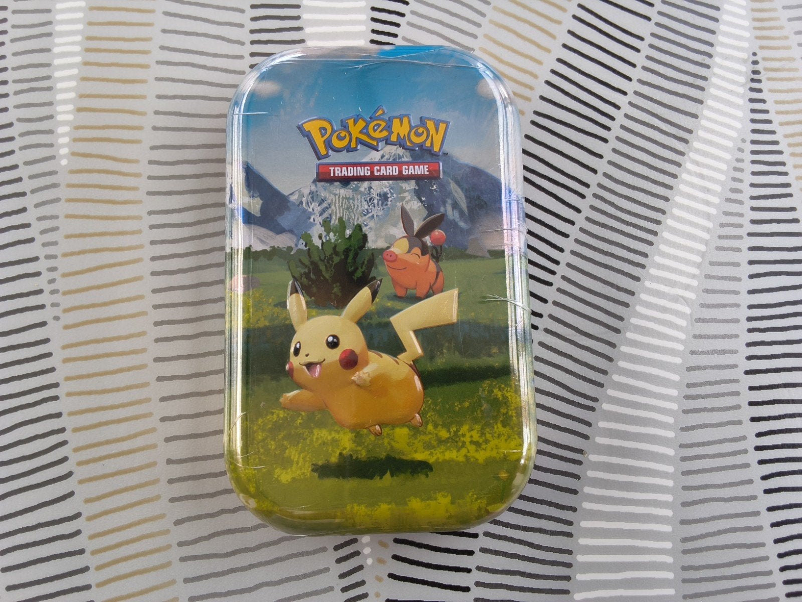 carte pokémon dans un boîtier sous blister., Enlèvement