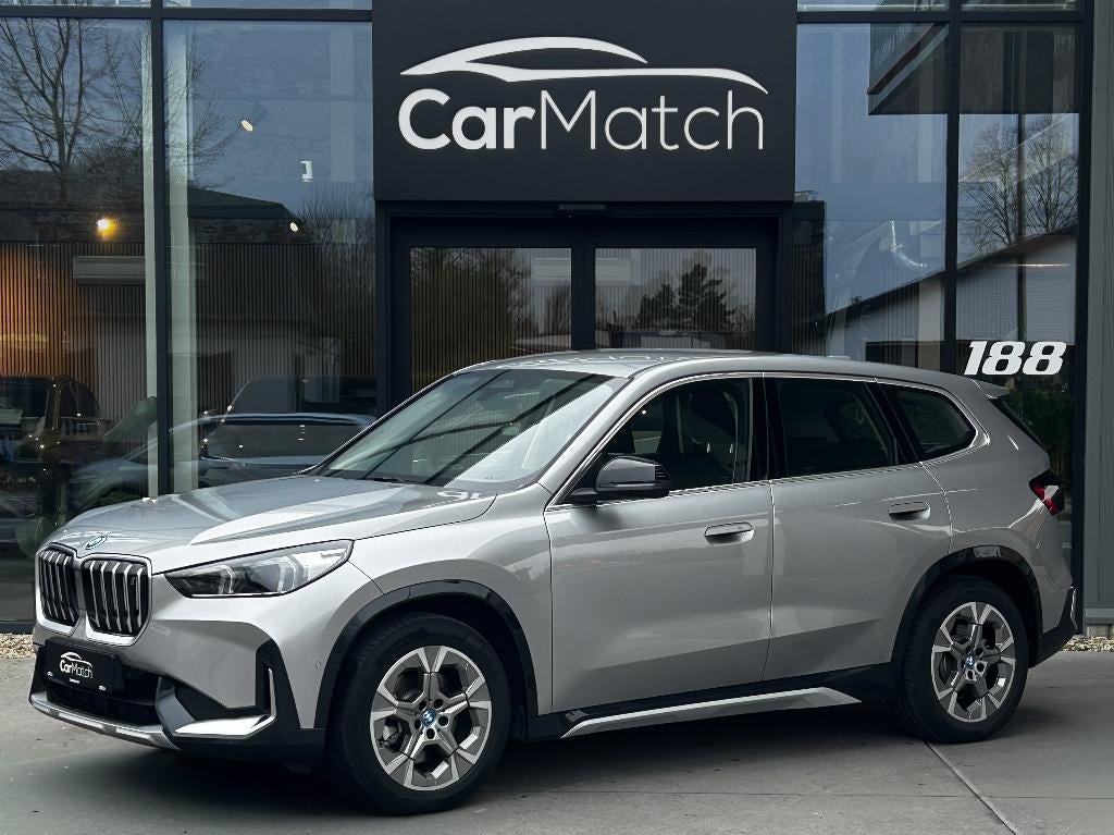 BMW iX1 xDrive30 - LEDER | CC | KEYLESS | CAMERA, Auto's, BMW, Bedrijf, Te koop, iX1, 4x4, ABS, Achteruitrijcamera, Adaptieve lichten