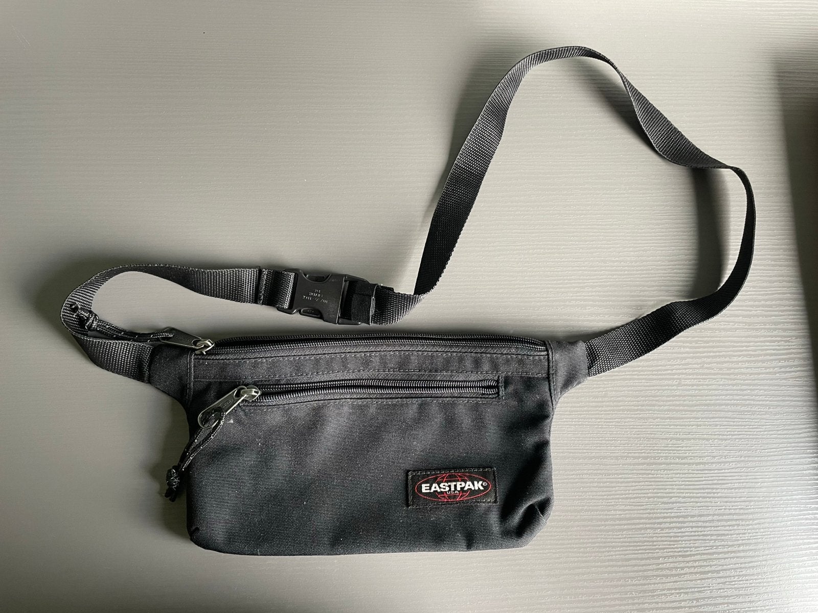 Originele Eastpak heuptas / fannypack – verstelbare riem, Ophalen of Verzenden, Zo goed als nieuw, Zwart, Overige merken